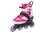 Une paire de rollers à roulettes roses avec des roues noires.