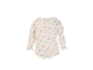 Body bébé blanc à manches longues avec motif floral.