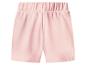 Short rose pour enfant avec taille élastique.