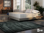 Un système de sommeil Hns avec un tapis gris.