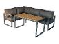Canapé d'angle extérieur avec coussins gris foncé et table rectangulaire à plateau en bois.