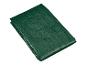 Une housse de protection verte pour mobilier de jardin.