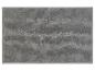 Tapis de bain gris texturé.