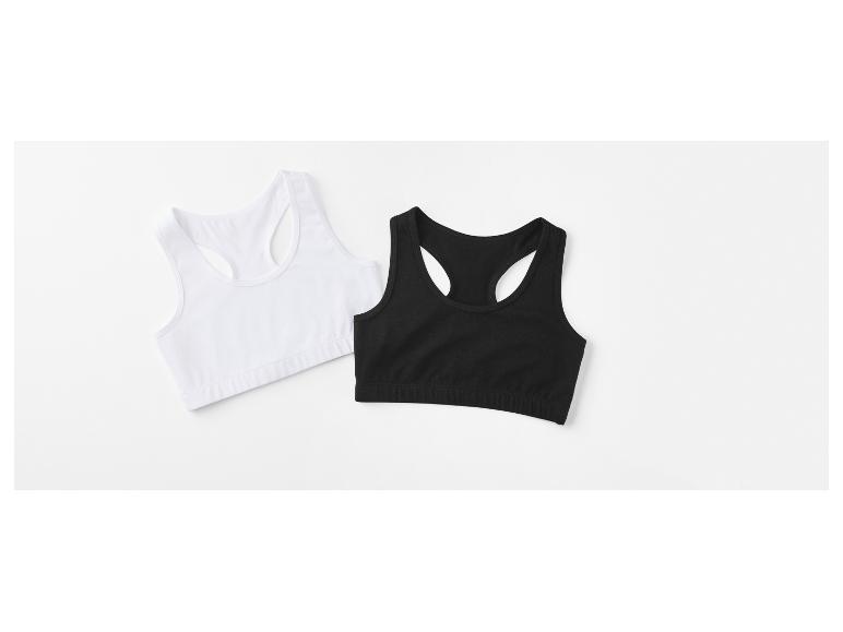 Soutiens-gorge de sport blancs et noirs.
