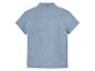Chemise à manches courtes en gaze de coton bleu clair.