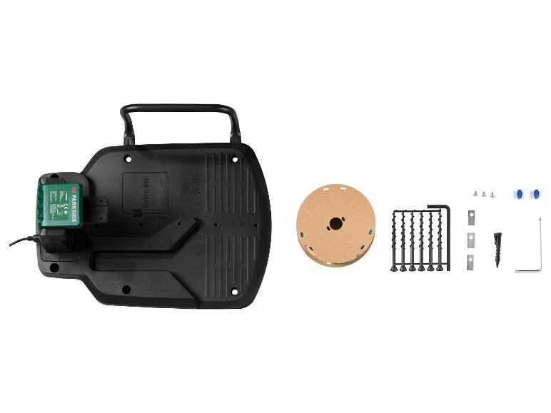 Kit d'installation de robot tondeuse Parkside avec station de charge et accessoires.