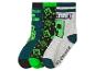 Trois paires de chaussettes avec des motifs pixelisés et du texte, en vert, noir et gris.