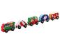 Un train jouet en bois avec une locomotive, une tente, un wagon avec un raton laveur et des cadeaux, un wagon avec une guimauve et un wagon avec des décorations de Noël.