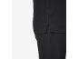 Gros plan d'un vêtement en tissu noir texturé, montrant une fente latérale et des détails de couture.