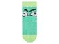 Une paire de chaussettes vertes avec un visage