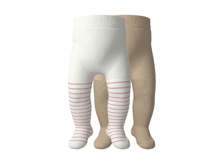 Deux paires de collants bébé, un blanc à rayures roses et un beige uni.
