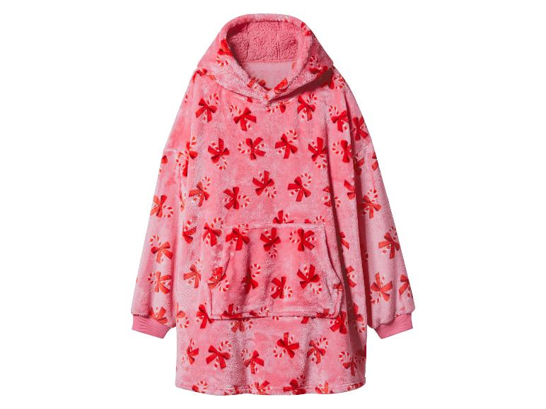 Sweat à capuche rose oversize avec un motif de cannes à sucre et de nœuds sur le thème de Noël.