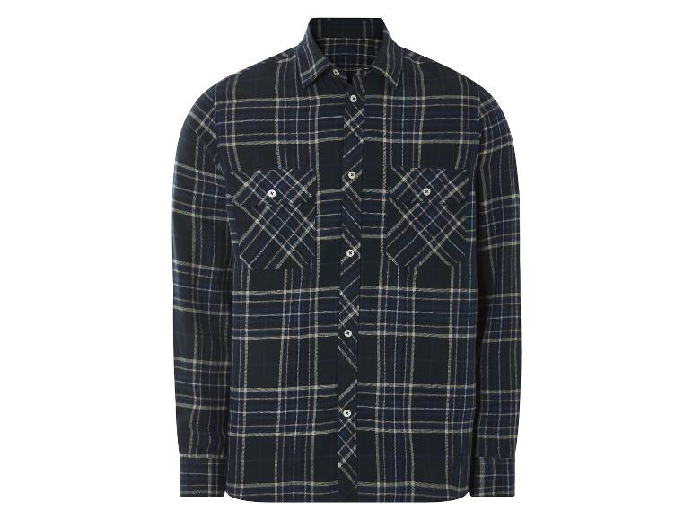Une chemise à carreaux à manches longues, de couleur bleu foncé.