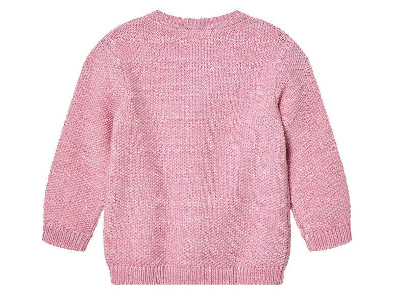 Pull rose à manches longues.