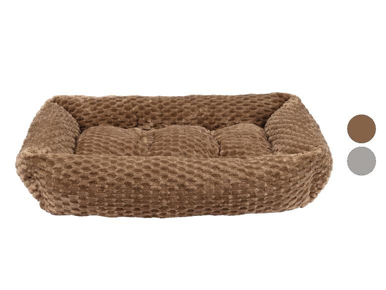 Lit douillet marron pour animaux de compagnie avec motif texturé et deux options de couleur.