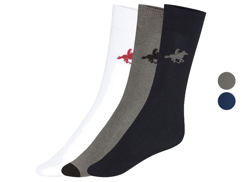Trois paires de chaussettes avec un motif de cheval en blanc, gris et bleu foncé.