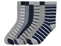 Six paires de chaussettes rayées en gris et bleu.