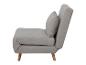 Canapé-lit gris clair avec coussin, style minimaliste.