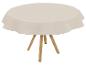 Nappe beige sur table ronde en bois.