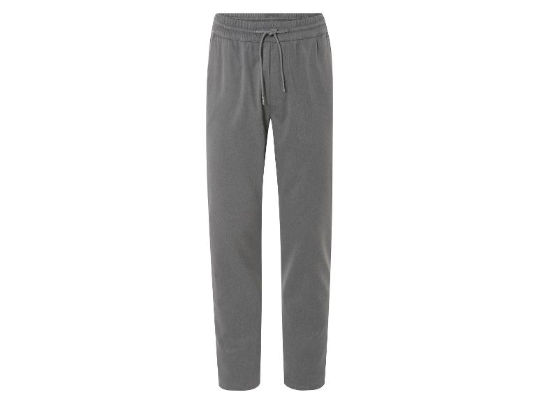 Pantalon de survêtement gris avec cordon.