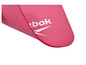 Un tapis de yoga rose avec le logo Reebok.