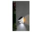 Applique murale solaire LED LIVARNO home avec détecteur de mouvement sur un mur gris.