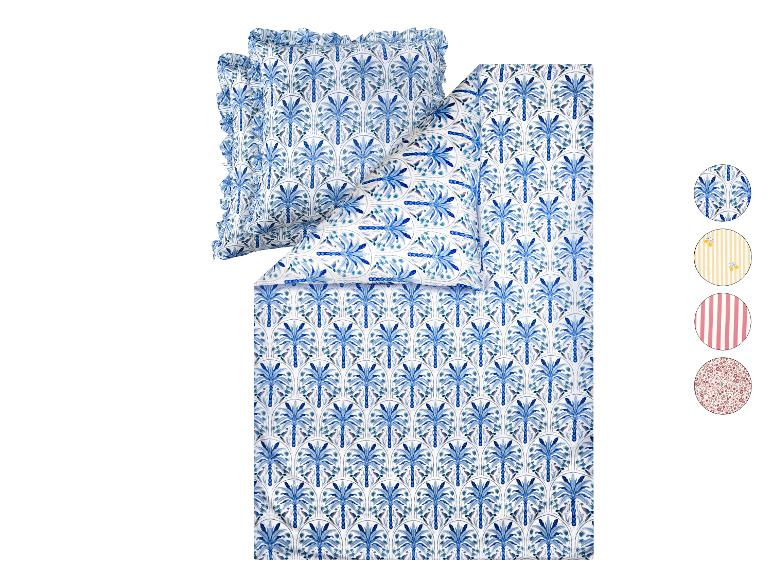 Parure de lit avec housse de couette et taies d'oreiller à motif palmiers bleus et échantillons.
