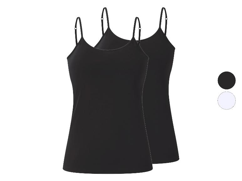 Deux débardeurs noirs à fines bretelles, avec un échantillon de couleur noir et blanc.
