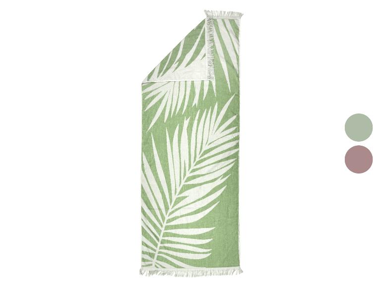 Serviette de plage verte avec motif feuilles de palmier blanches et pompons