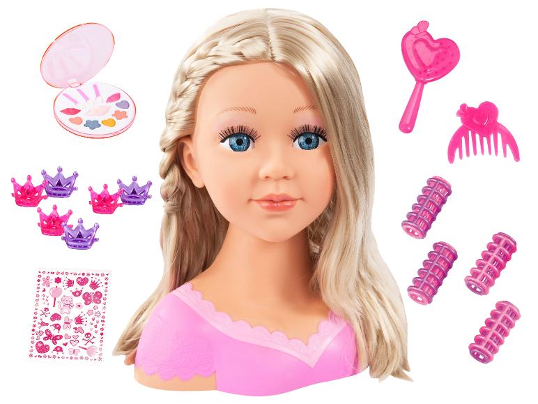 Tête à coiffer blonde avec maquillage, bigoudis, couronnes et accessoires