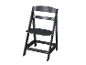 Une chaise haute Tripp Trapp noire.