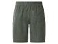 Short en coton vert foncé avec taille élastique et poche arrière.