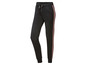 Pantalon de survêtement noir avec des rayures roses.