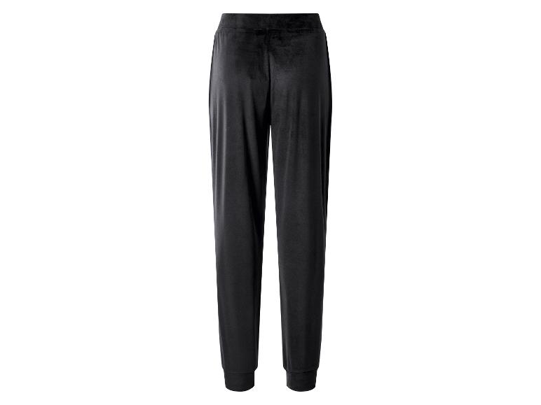 Pantalon de jogging en velours noir avec taille élastique et chevilles resserrées.