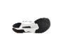 Semelle de chaussure de course blanche et noire avec l'inscription 'CARBON PLATE'.