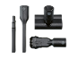 Quatre accessoires d'aspirateur noirs : suceur plat, suceur pour tissus d'ameublement pro et brosse multi-usage.