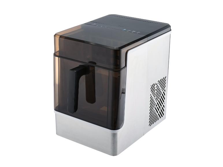 Machine à glaçons compacte avec couvercle transparent foncé, panneau de commande et base en acier inoxydable.