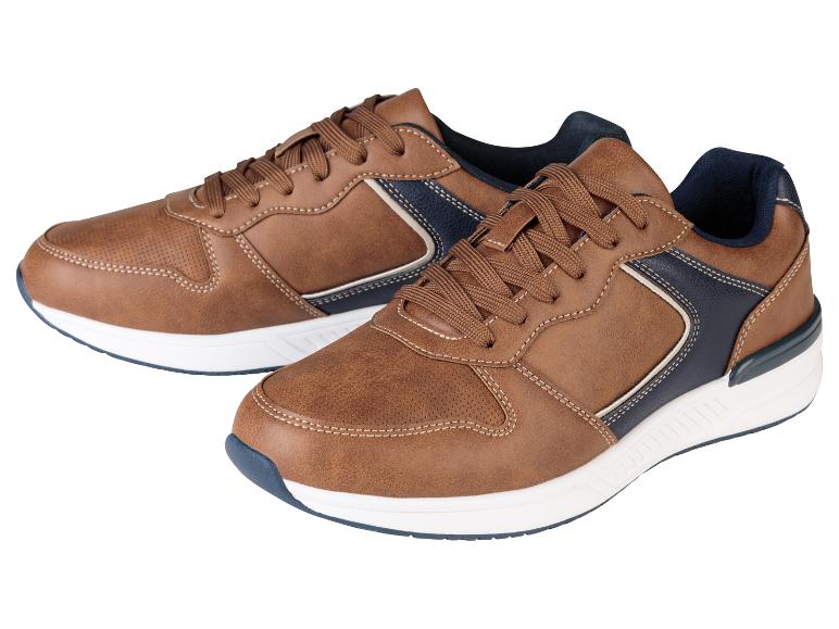Chaussures de sport marron pour homme avec des détails bleus.