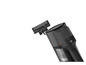 Un aspirateur sans fil noir Grundig avec une tête de brosse.