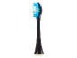 Une brosse à dents électrique noire avec des poils bleus.