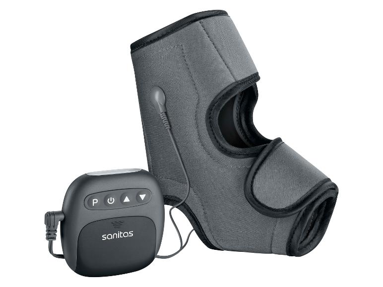 Un support de coude gris avec une unité de commande attachée pour l'électrostimulation.