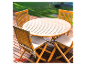 Ensemble table et chaises en teck pour extérieur.