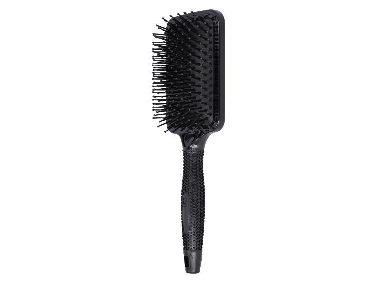 Brosse à cheveux noire avec manche texturé et poils