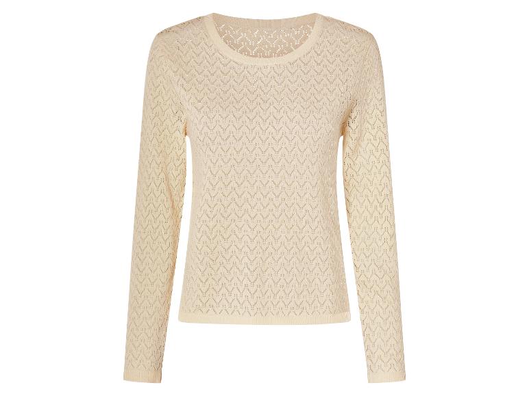 Pull beige clair en tricot ajouré.