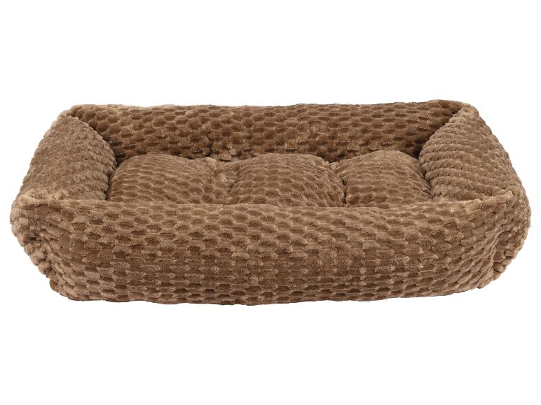 Lit marron et doux pour animaux de compagnie avec un motif texturé.