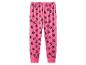 Pantalon de jogging rose pour enfant avec empreintes de pattes.