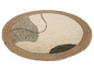 Tapis rond avec bordure en jute et motif abstrait en beige et vert.