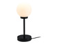 Lampe de table noire avec un abat-jour rond blanc.