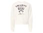 Sweat-shirt crème avec texte 'Creative Vibes' et motif de nœud tacheté.