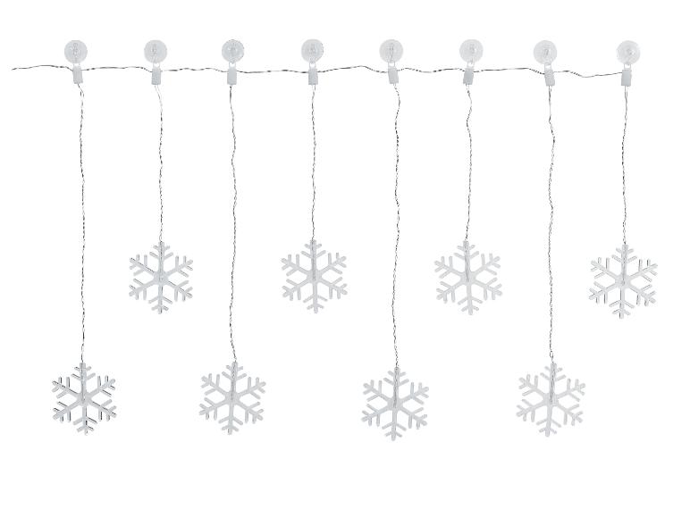 Guirlande lumineuse avec huit flocons de neige argentés suspendus à des ventouses.